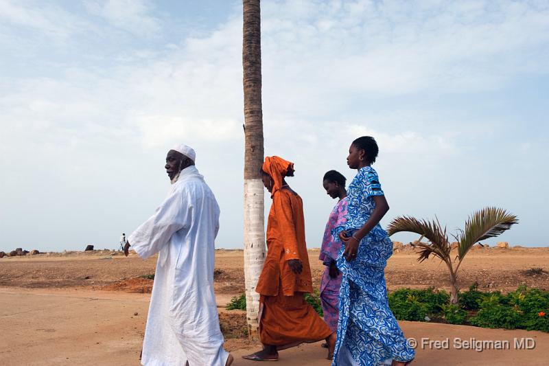 20090528_093617 D3 P1 P1.jpg - The decision to come to Senegal (Dakar) was quite last minute and we do not know what to expect.  My knowledge of the country when I landed was minimal.   As we pass some people walking on the side of the road, I learn that 95% of Senegalese are Muslim.  Our driver is Muslim too and was soon pointing out that some of the people in his family had married Christians, and that many Christians held important political positions in the country, and several were Christian or married to Christians.   He considered the people of Senegal to be very religiously tolerant.  In fact, it is one of the most religiously tolerant contries in the world where the majority of the people are of the Islamic faith.  The first President of the country, Léopold Sédar Senghor, who is regarded by many as one of the most important African intellectuals of the 20th century, was Catholic